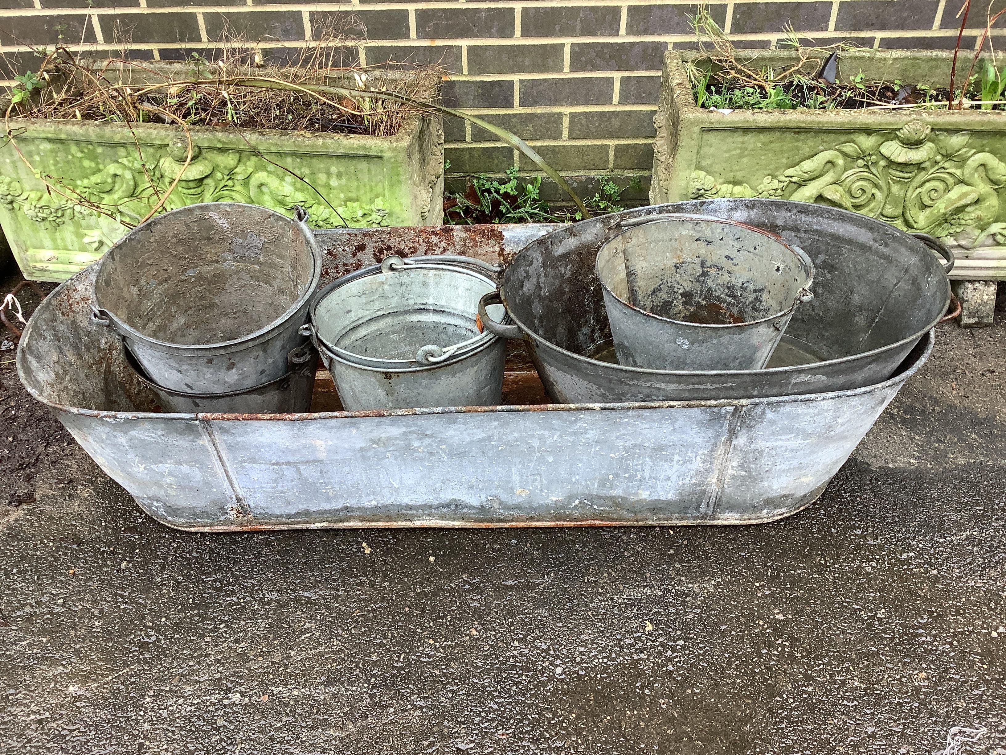 Seven assorted galvanised containers, largest length 140cm